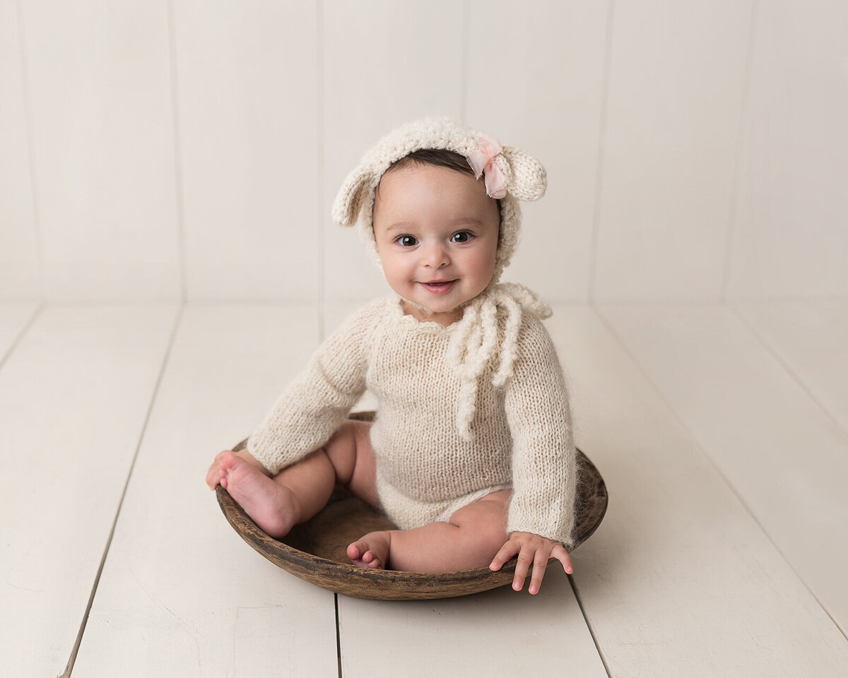 Smiling baby in a Bucket photography by Laura King