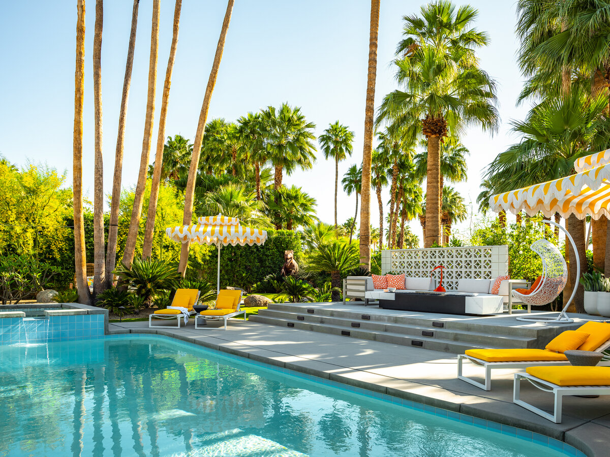 Modern backyard design  with bright midcentury modern colors and breeze block designed by Palm Springs architect.