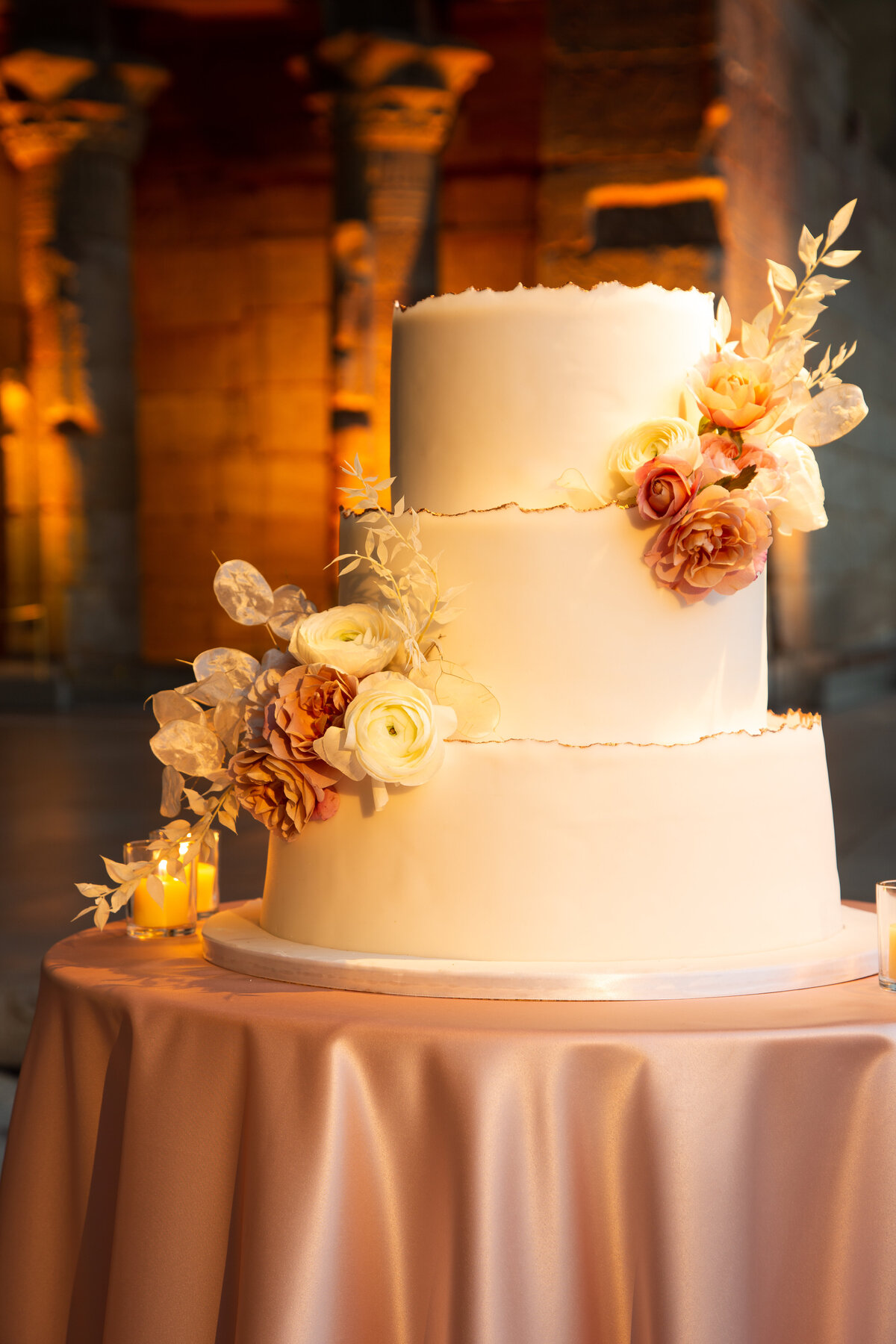 3 tier wedding cake with fall floral