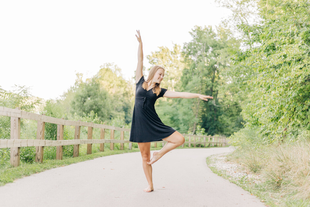 girl dancing on a path