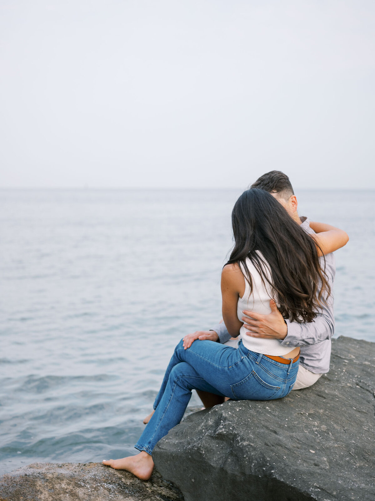 Bride and groom's candid moment  at their beach engagement session.