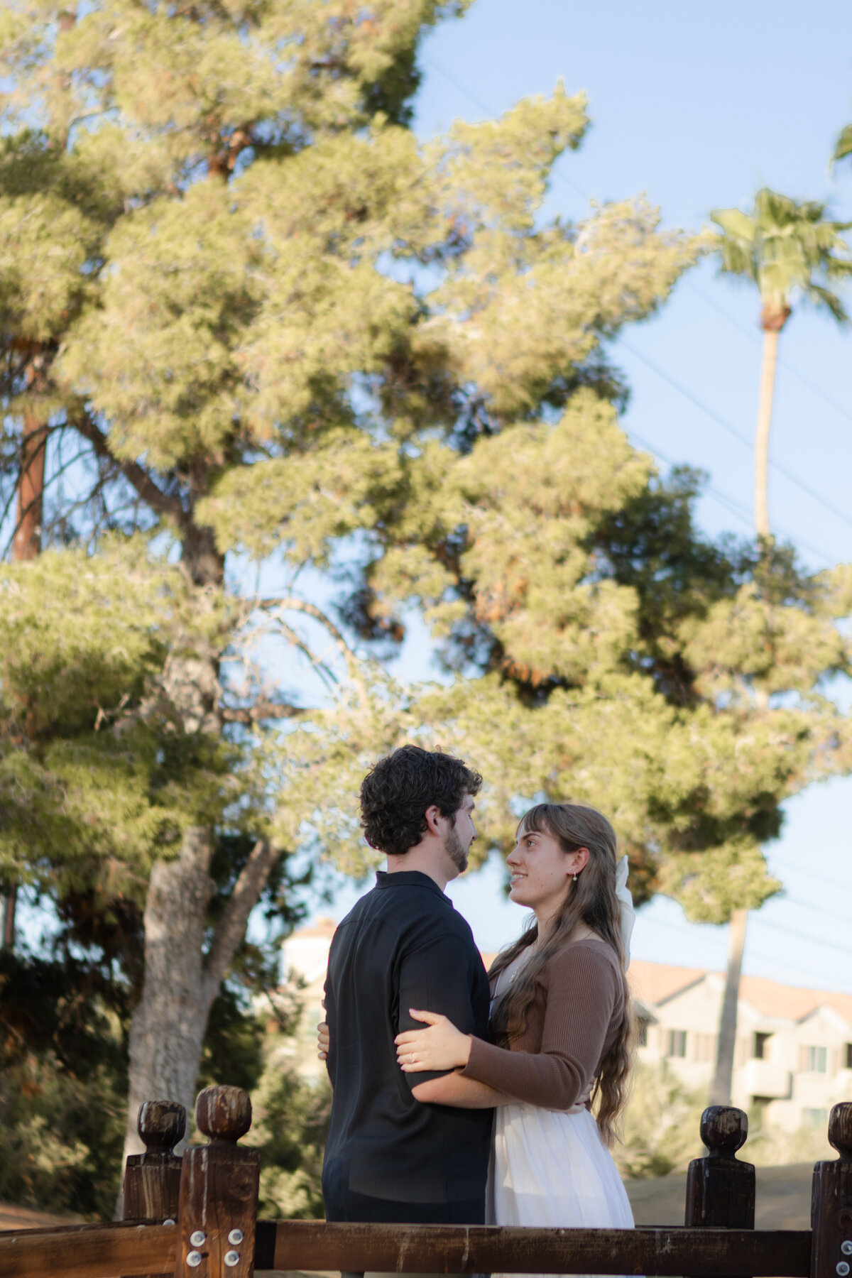 Jovanna G Photography. Classic, sophisticated Wedding Photos. Soft romantic engagement photos. Soft romantic WeddingPhotos. Sophisticated Wedding Photographer. Professional Wedding Photographer. Destination Wedding Photographer. Luxury Wedding photographer. Traveling Wedding Photographer. AZ Wedding Photographer. Gilbert AZ Wedding Photographer. Queen Creek Wedding Photographer. Phoenix Wedding Photographer. Scottsdale Wedding Photographer. Flagstaff Wedding Photographer. SoCal Wedding Photographer. California Wedding Photographer. Northern California Wedding Photographer. Southern California Wedding Photographer. San Francisco Wedding Photographer. Bay Area Wedding Photographer. San Jose Wedding Photographer. Golden Gate Bridge Wedding Photographer. Beach Lover Wedding Photographer. Palace of the Fine Arts Wedding Photographer. Ocean Lover. I love California. Orange County Wedding Photographer. Newport Beach Couples Photographer. Newport Beach Wedding Photographer. Laguna Beach Couples Beach Engagement Photographer. Laguna Beach wedding beach photographer. Los Angeles Wedding Photographer. Young and in love engaged couples who live in southern California. Christian Young Couple. Young Engaged Couple. Engaged High School Christian Couple. Christian Values. Young conservative Christian women. Young Conservative Christian men. Young Conservative Christian Couple. Young Christian Couple Engaged in High School. Young Christian College Couple. Lakeside Lovers in the Autumn Sun. David & Grace - engagement photos. Jovanna G Photographer Engagement Photos. Arizona sun shining through autumn trees- engagement. Chandler, AZ Engagement Photos. Chandler, AZ 2026 bride. Chandler, AZ Wedding Photographer. Chandler, AZ Young Engaged Couple. Girl in her 20s. Engaged Arizona Girl in her 20s. Lakeside Engagement photos. AZ Lakeside Engagement Photos. AZ Weeping Willow Lakeside Proposal. Arizona Lakeside Proposal with weeping willow tree. Detail shot of engagement ring on Arizona Lakeside estate. Chandler, AZ Lakeside Estate Proposal Outfit Inspiration.