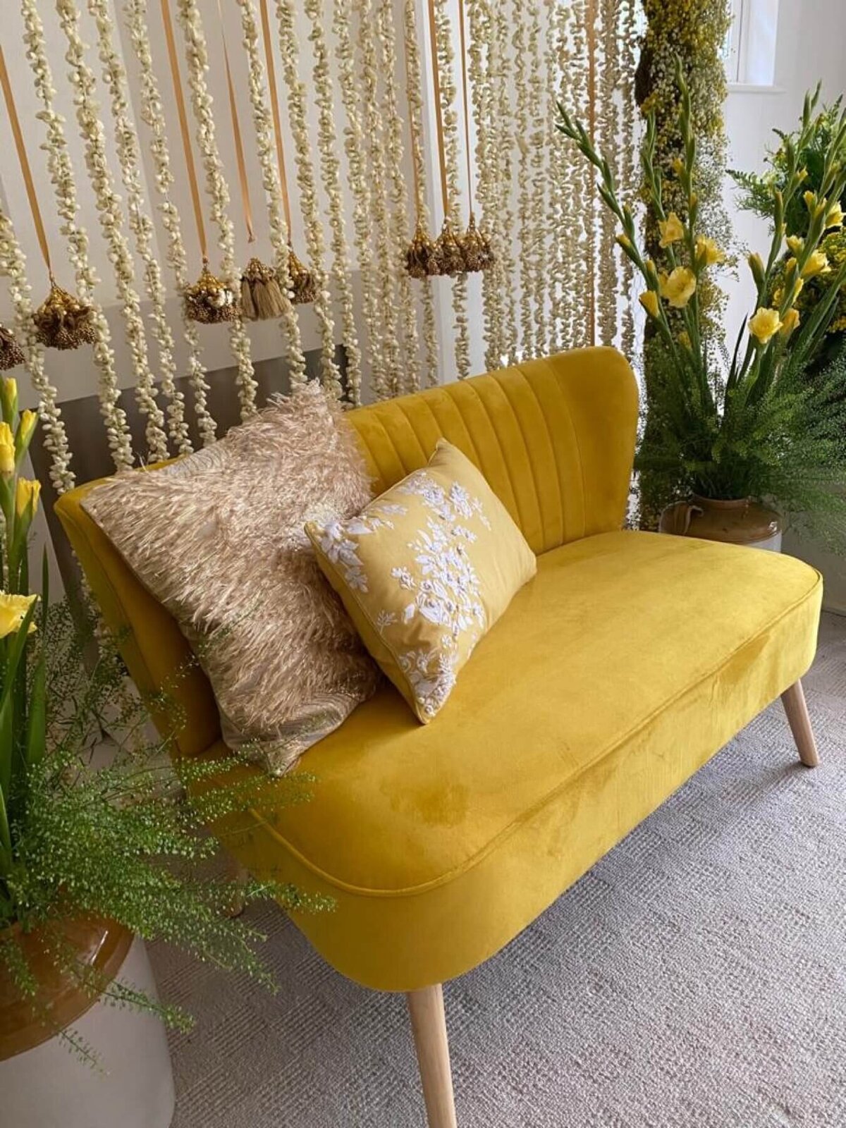 Yellow sofa seat with cushions