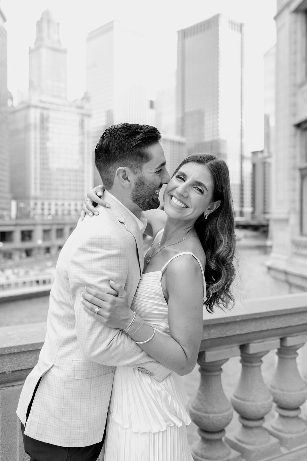 An engagement photography session at The Wrigley Building and North Ave Beach in Chicago, Illinois - 13
