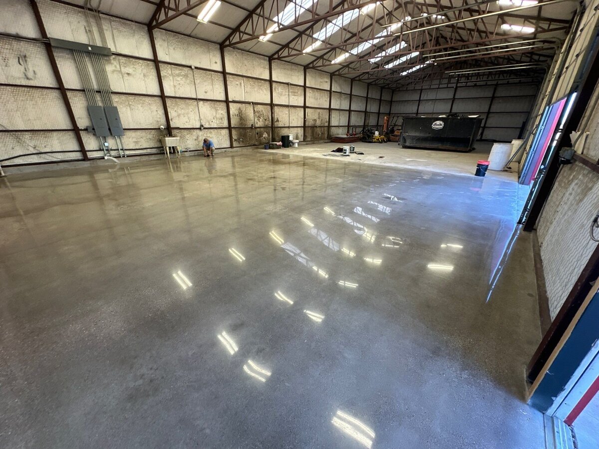 Polished Concrete for Home Renovations in DFW showcasing beautifully polished concrete floors in a home renovation project, highlighting the sleek, modern finish and quality craftsmanship in the Dallas-Fort Worth area.
