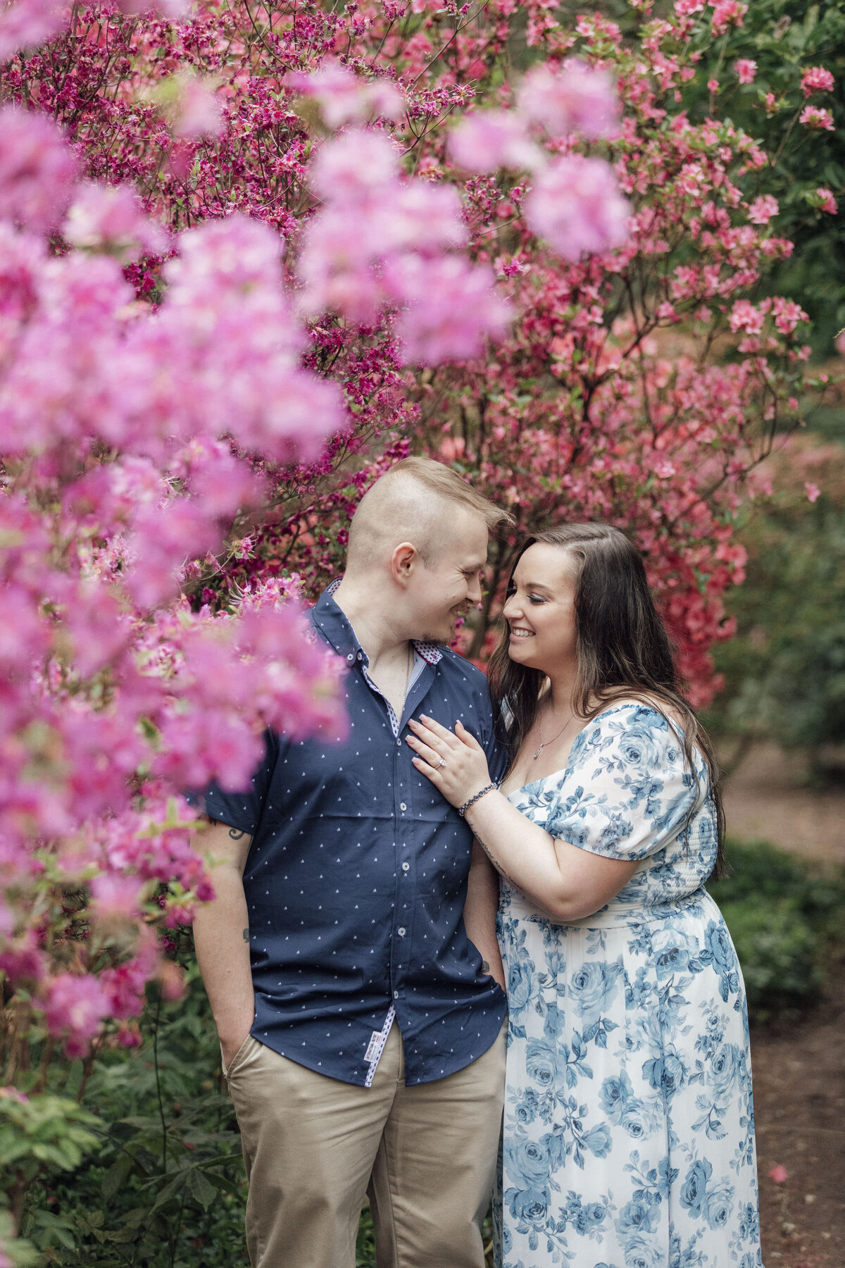 Laughing couple during engagement session at Sayen House and Gardens in Hamilton Township New Jersey