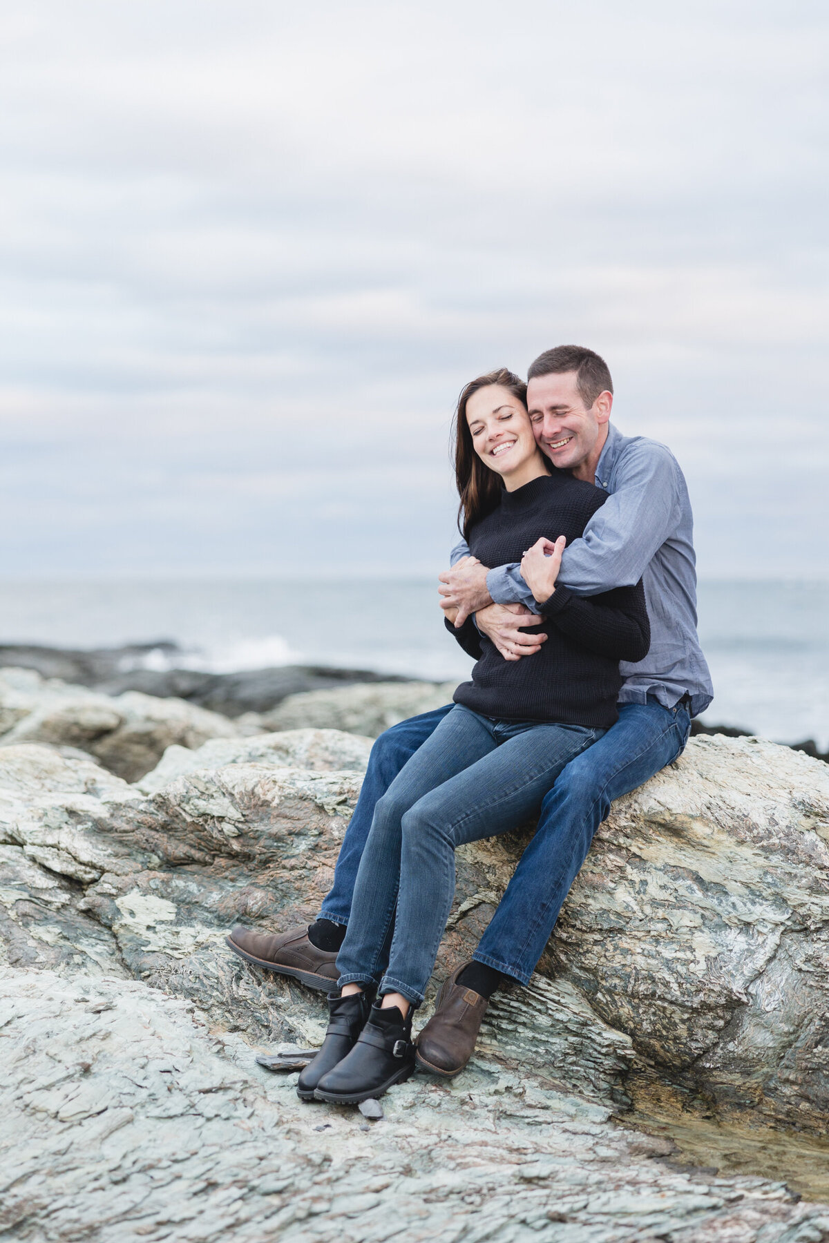 Engaged couple on the coast line of Rhode Island