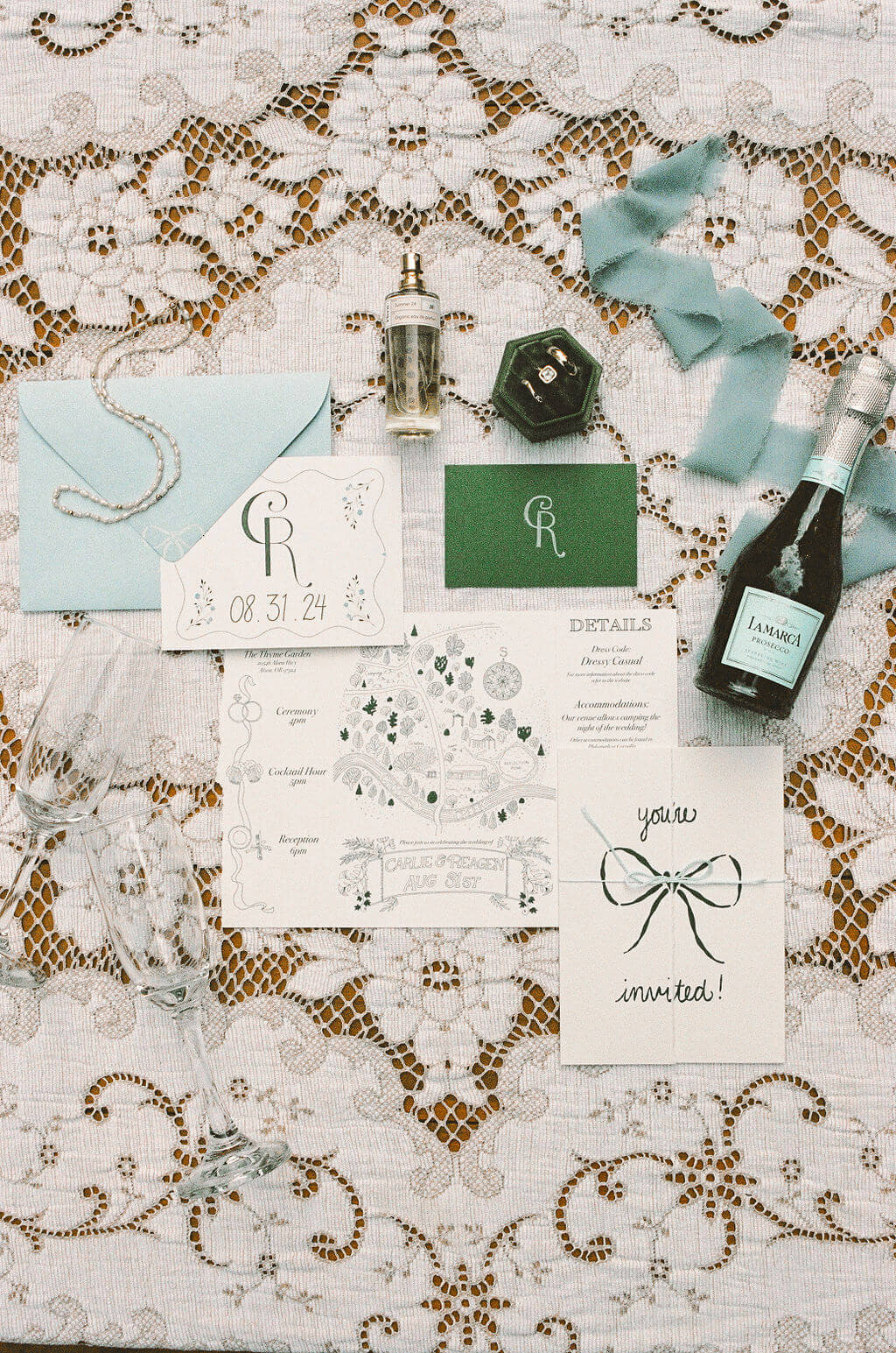 Vintage garden details including invitations, jewelry and ribbon.