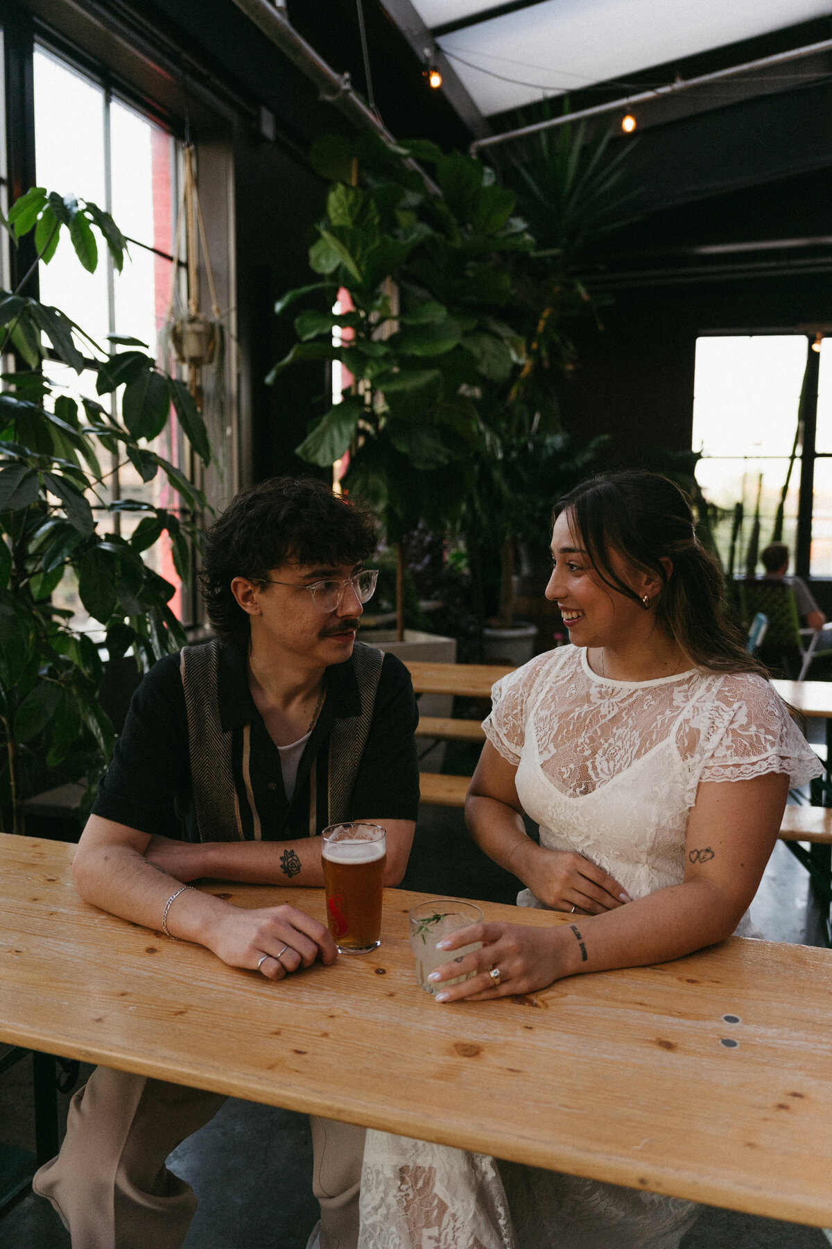 couple enjoying drinks at indoor venue
