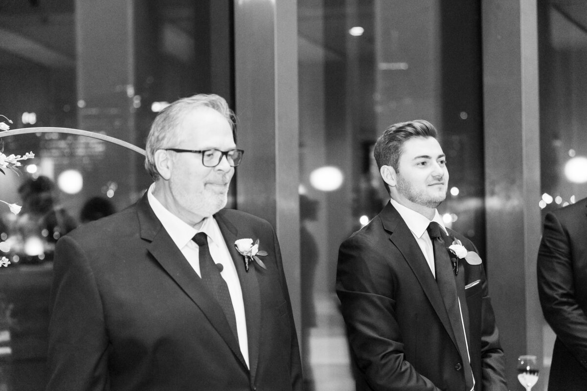 Groom looking at bride walking down the aisle at Tennessee State Museum