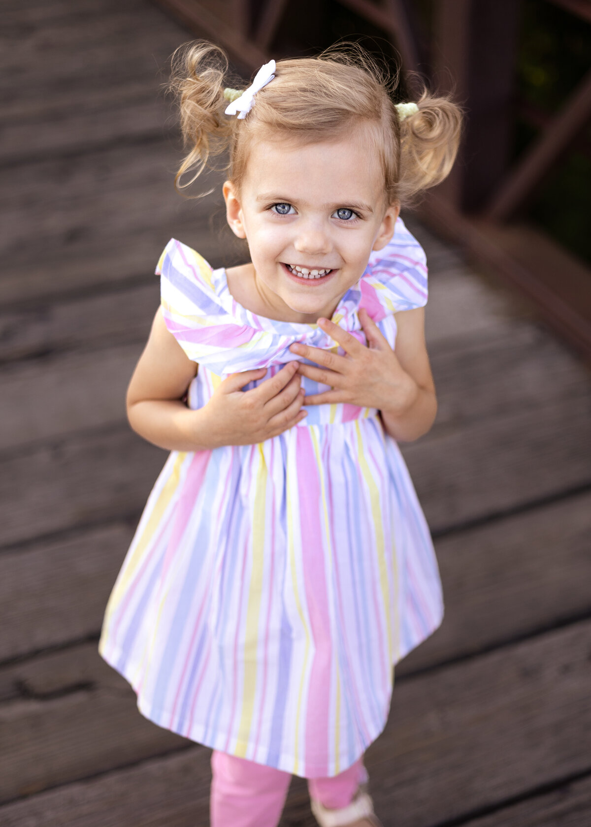 Child Posing on Bridge