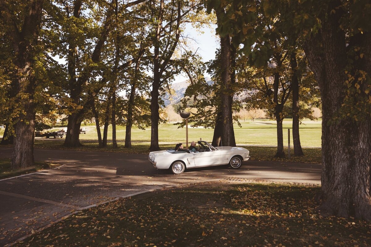 Autumn wedding shoot at Millbrook, Arrowtown. Vintage car & helicopter.