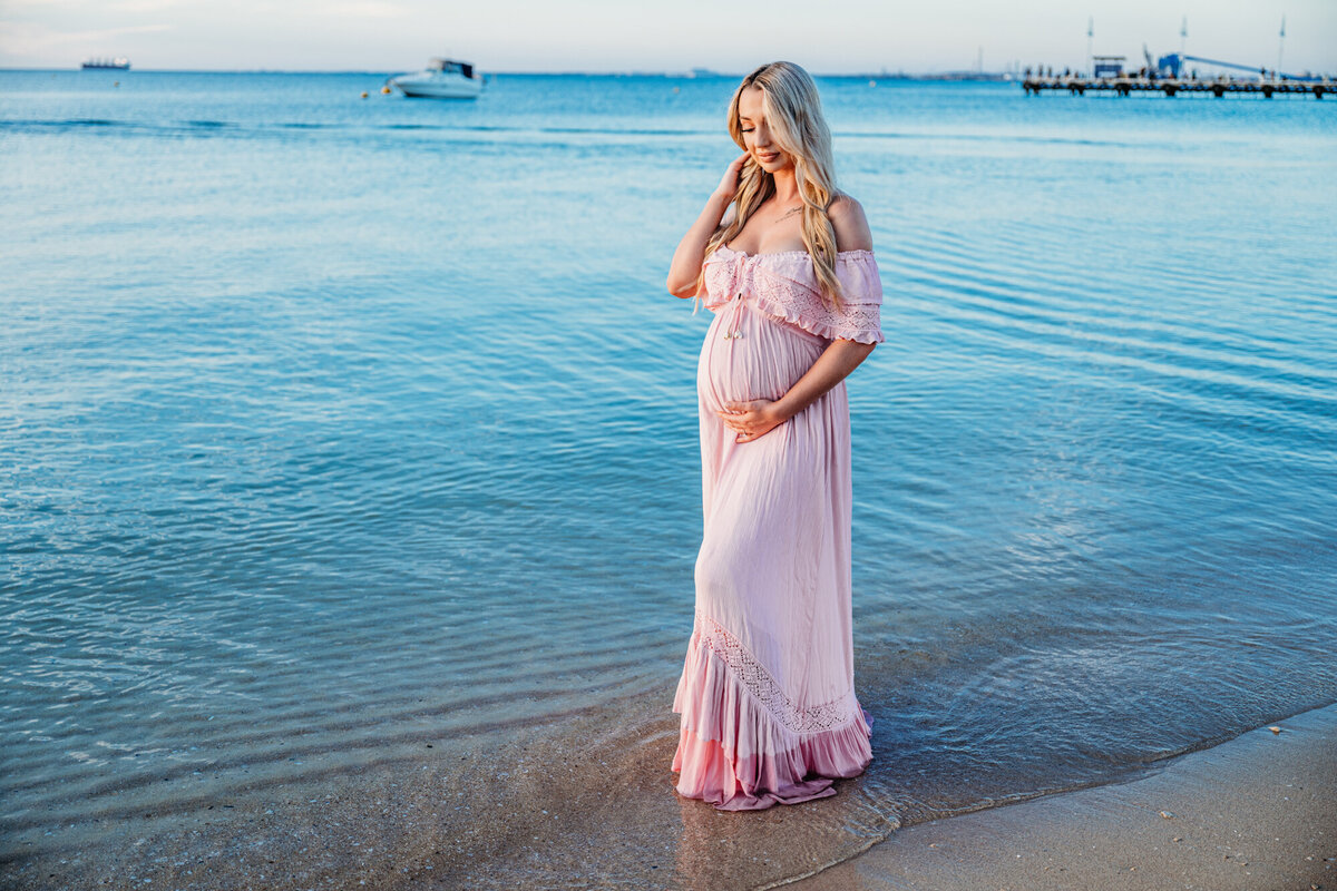 Expectant mom on southern california beach for her maternity photo session