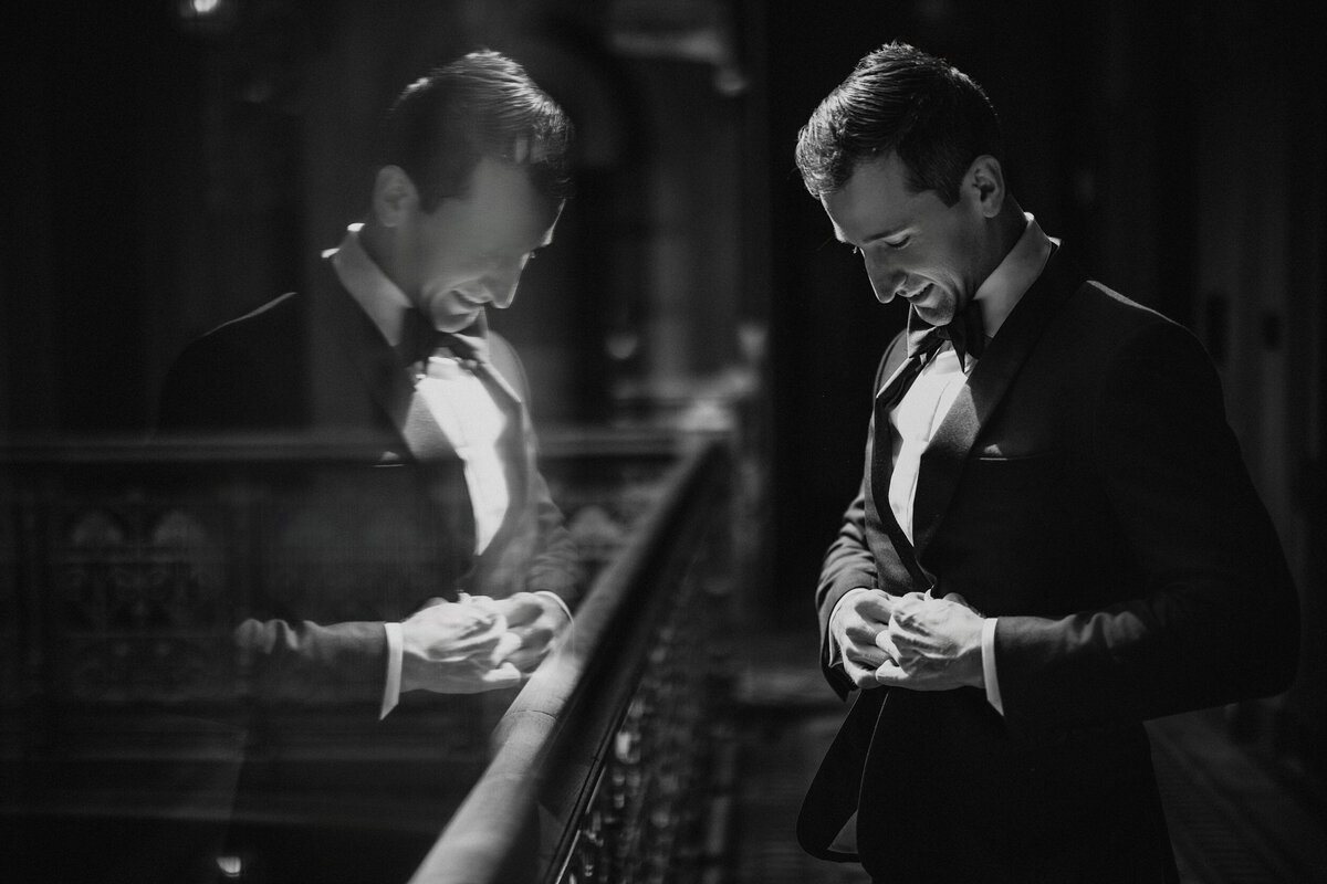 A groom gets dressed  at a Beekman Hotel wedding