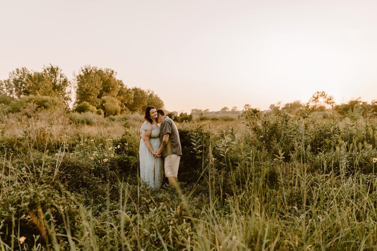 sunset-couples-session-wildflower-field-ada-hayden-heritage-park-ames-iowa-storyteller-collective-photo-co