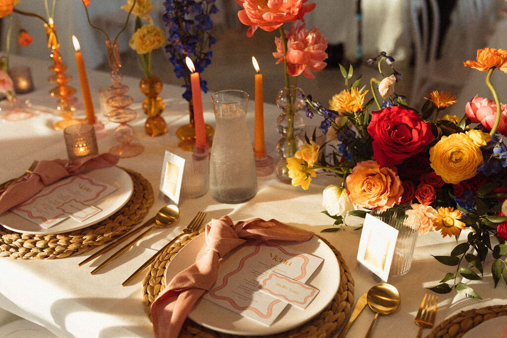 Elegant, custom-designed floral centerpiece featuring seasonal blooms, crafted by The Floral Eclectic for a Dallas event.