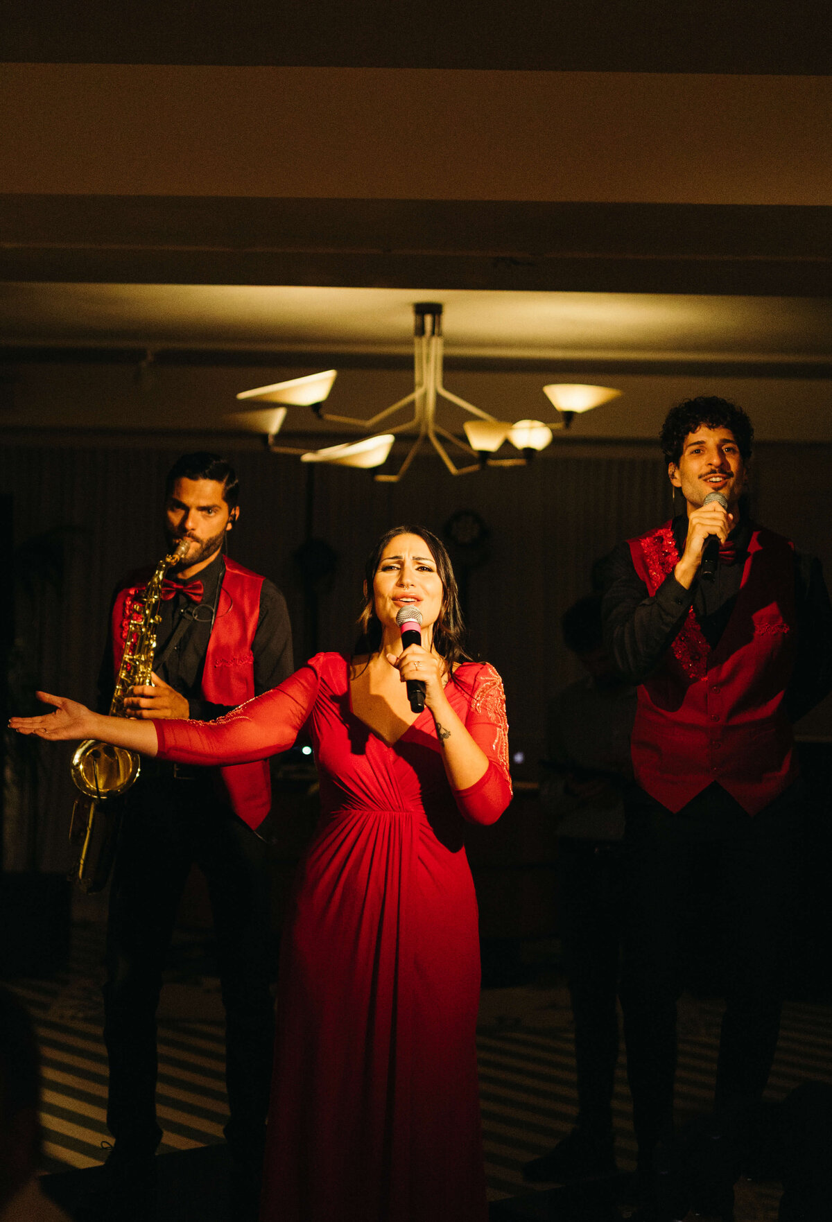 Saxophonist and singer performing at chic Rome wedding celebration


