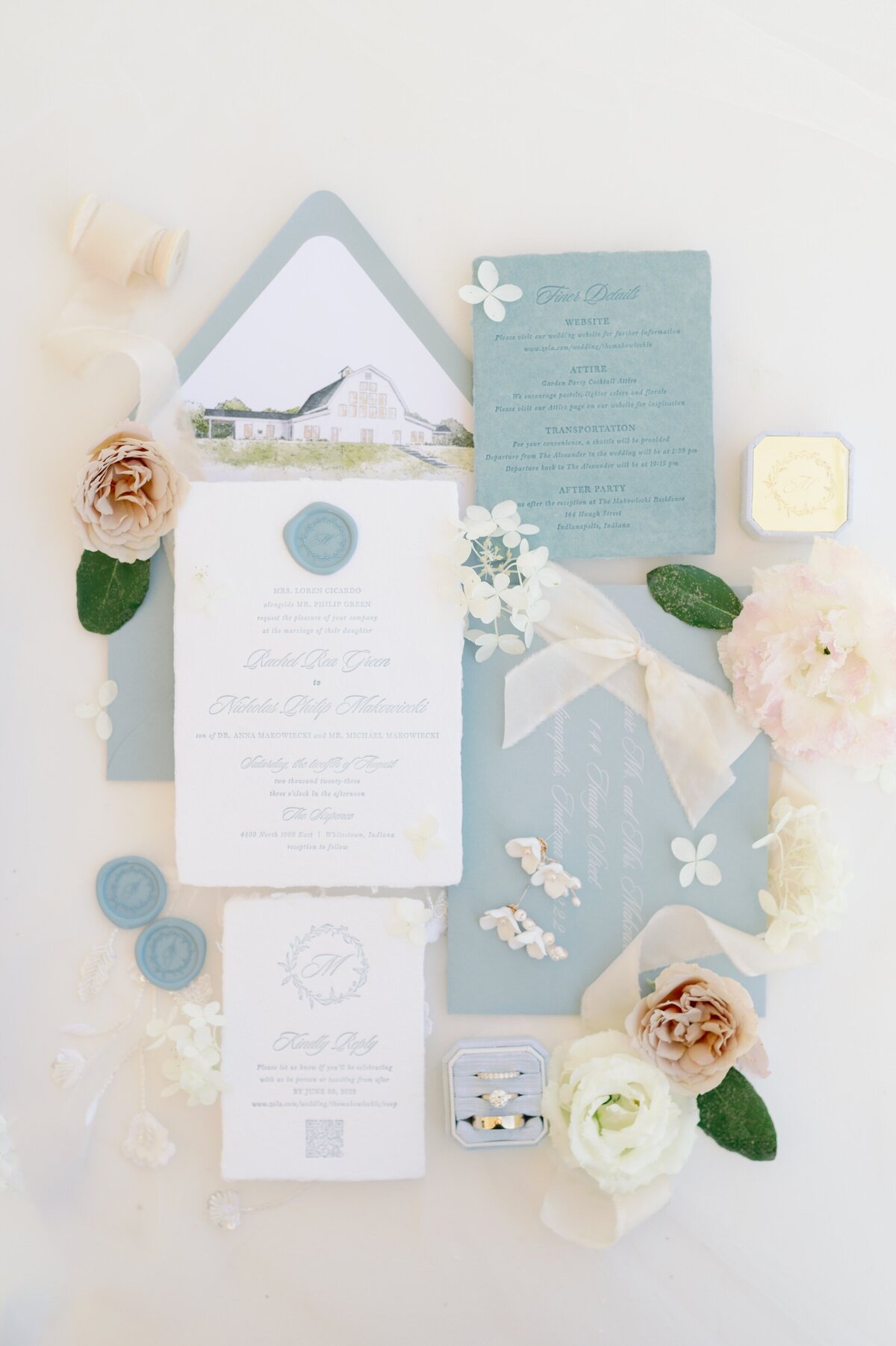 blue and white wedding stationery for a Notre Dame wedding