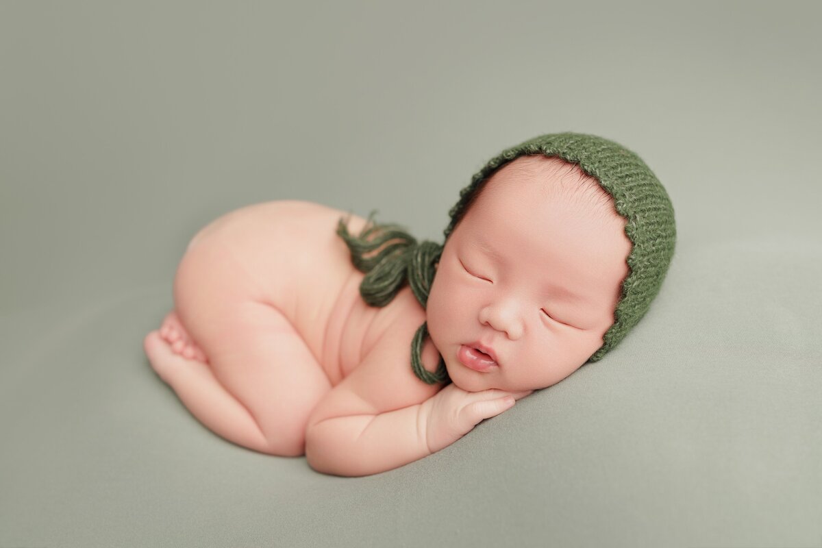 Beautiful newborn portraits in Elk Grove and Sacramento, capturing your baby's precious moments with simple elegance. Book your session today