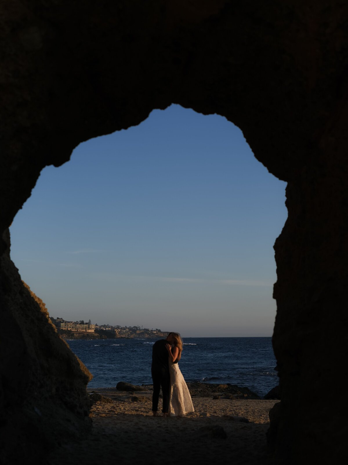 Couple together in cave at Treasure Island