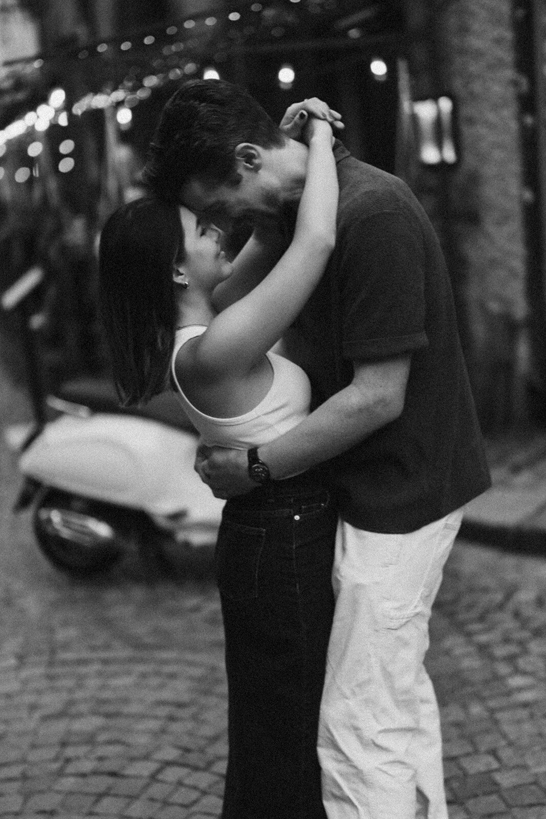 Bride and Groom kissing in front of sparklers
