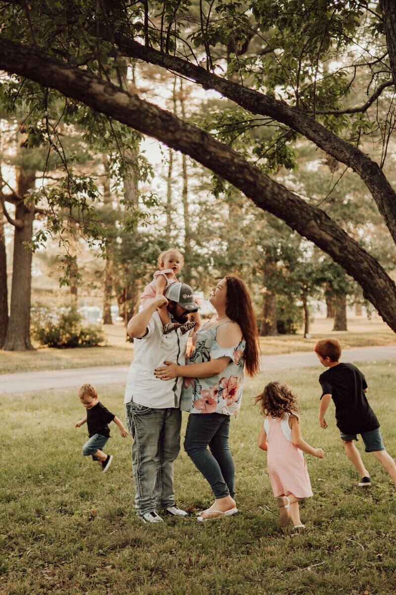 Family-Playful-Outdoor-Session-Waterworks-Park-des-moines-iowa-Storyteller-Collective-Photo-Co