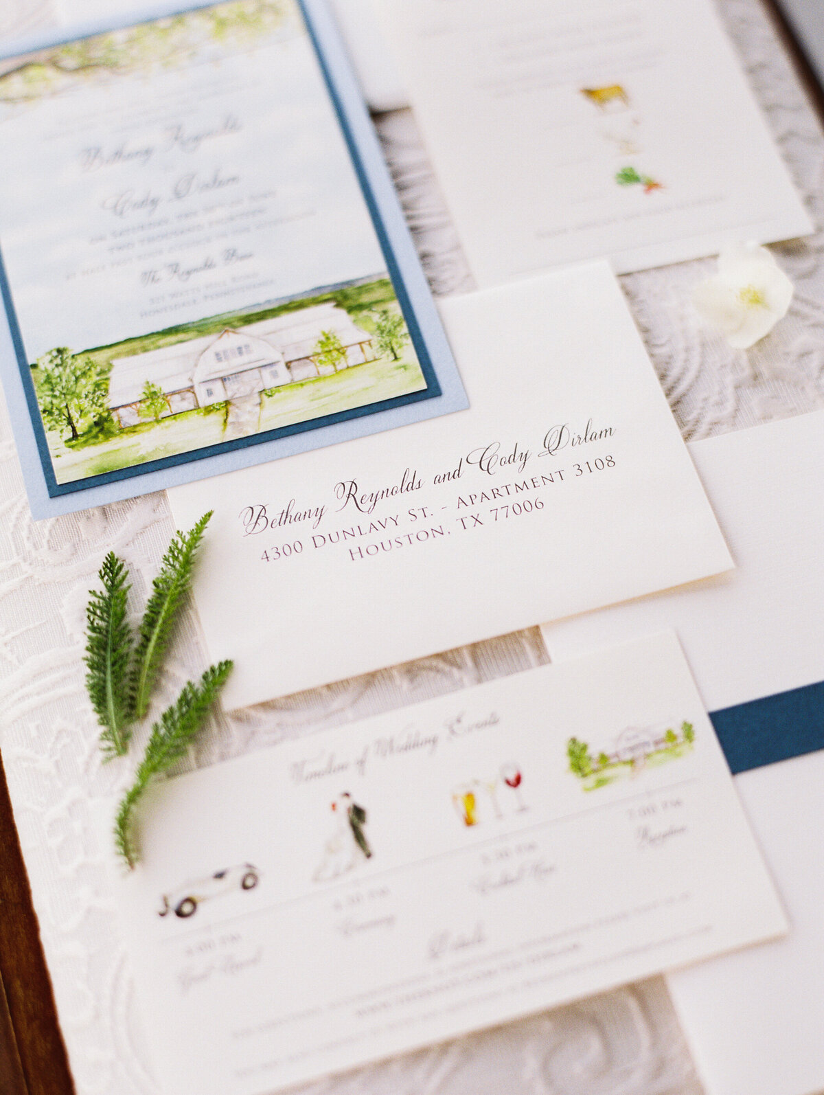Close-up of wedding stationery with detail cards
