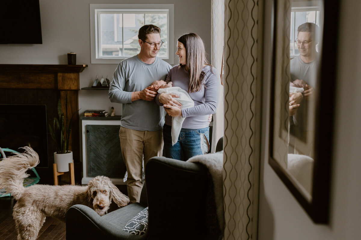 Parents holding newborn