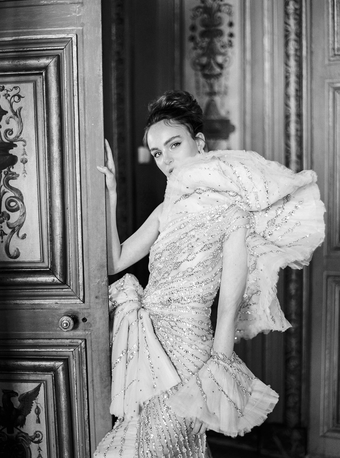 The photo was taken at Paris, France - Chateau Vaux le Vicomte, one of the top destination wedding venues in France, captured beautifully by photographer Audrey FORA. In addition to Audrey FORA's photography, East West Films also offers videography services at the venue.