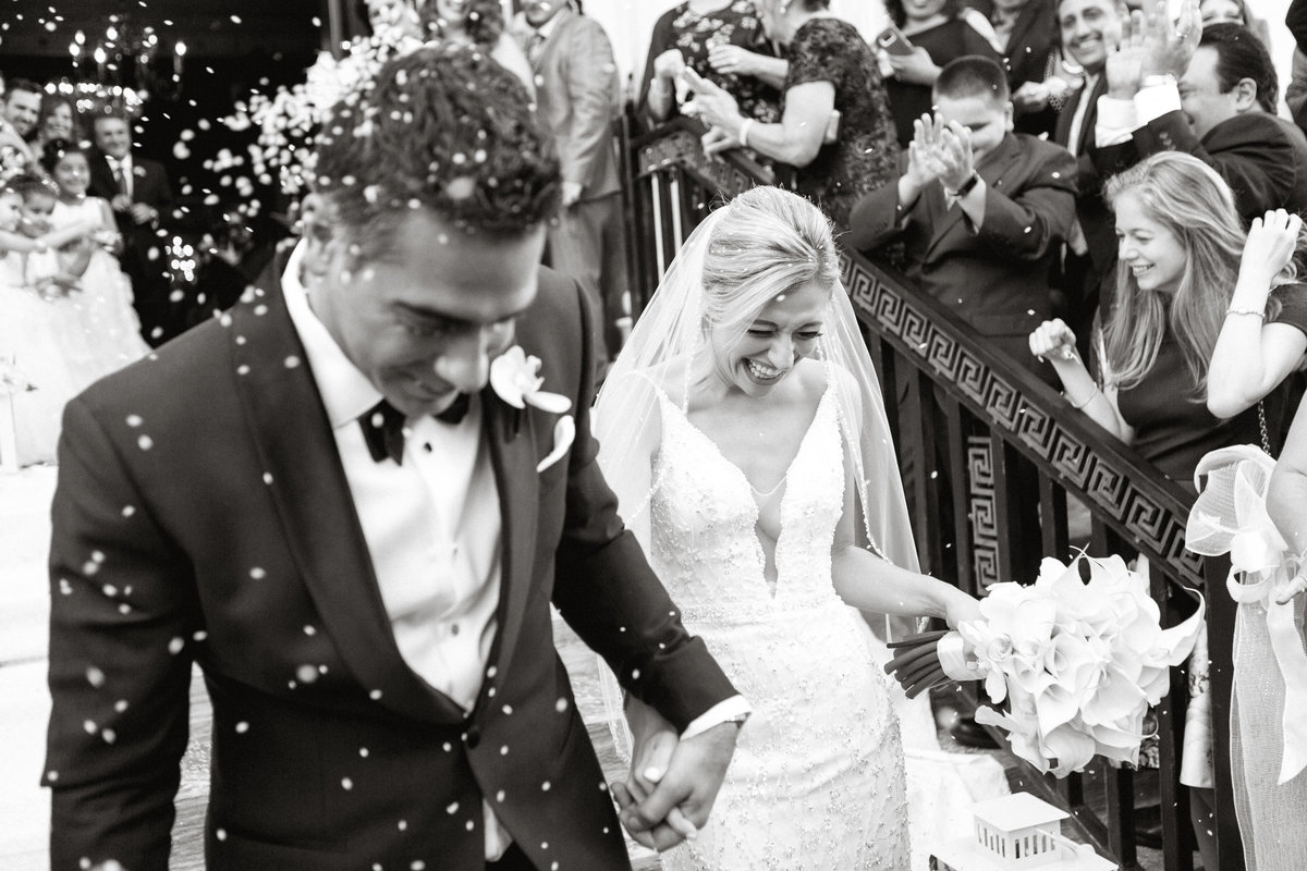 It's raining rice! This newly wed couple photographed exiting the Greek Orthodox Church in Philadelphia, PA.