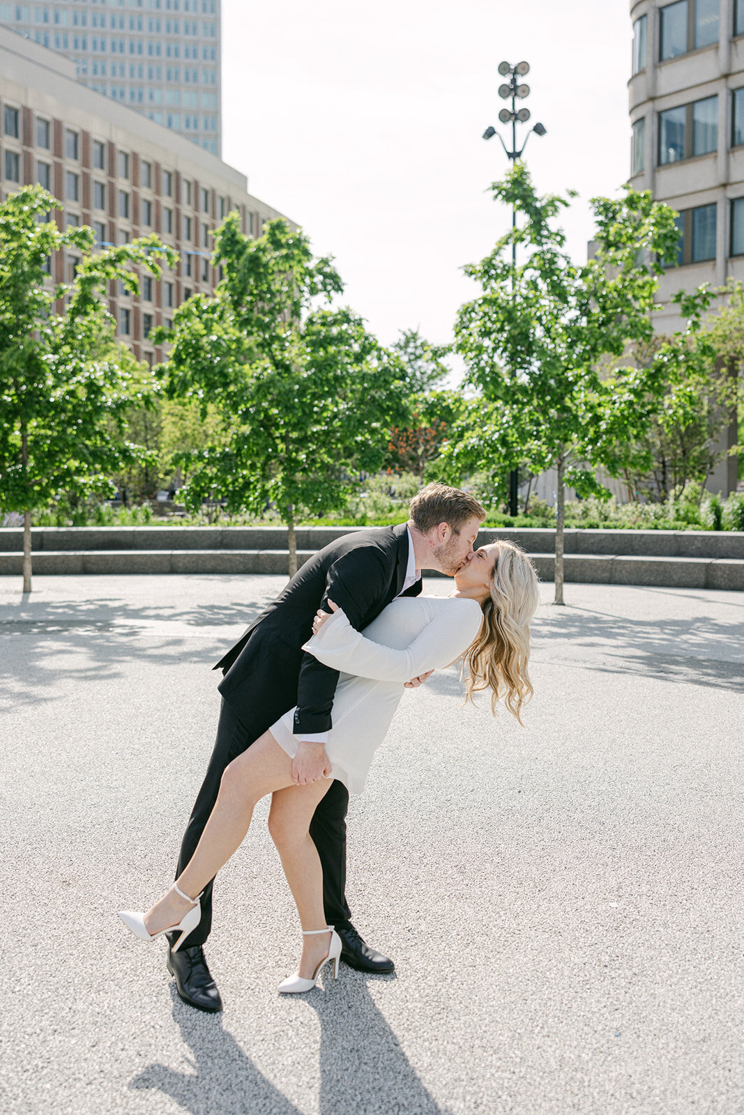 a newly engaged couple kissing