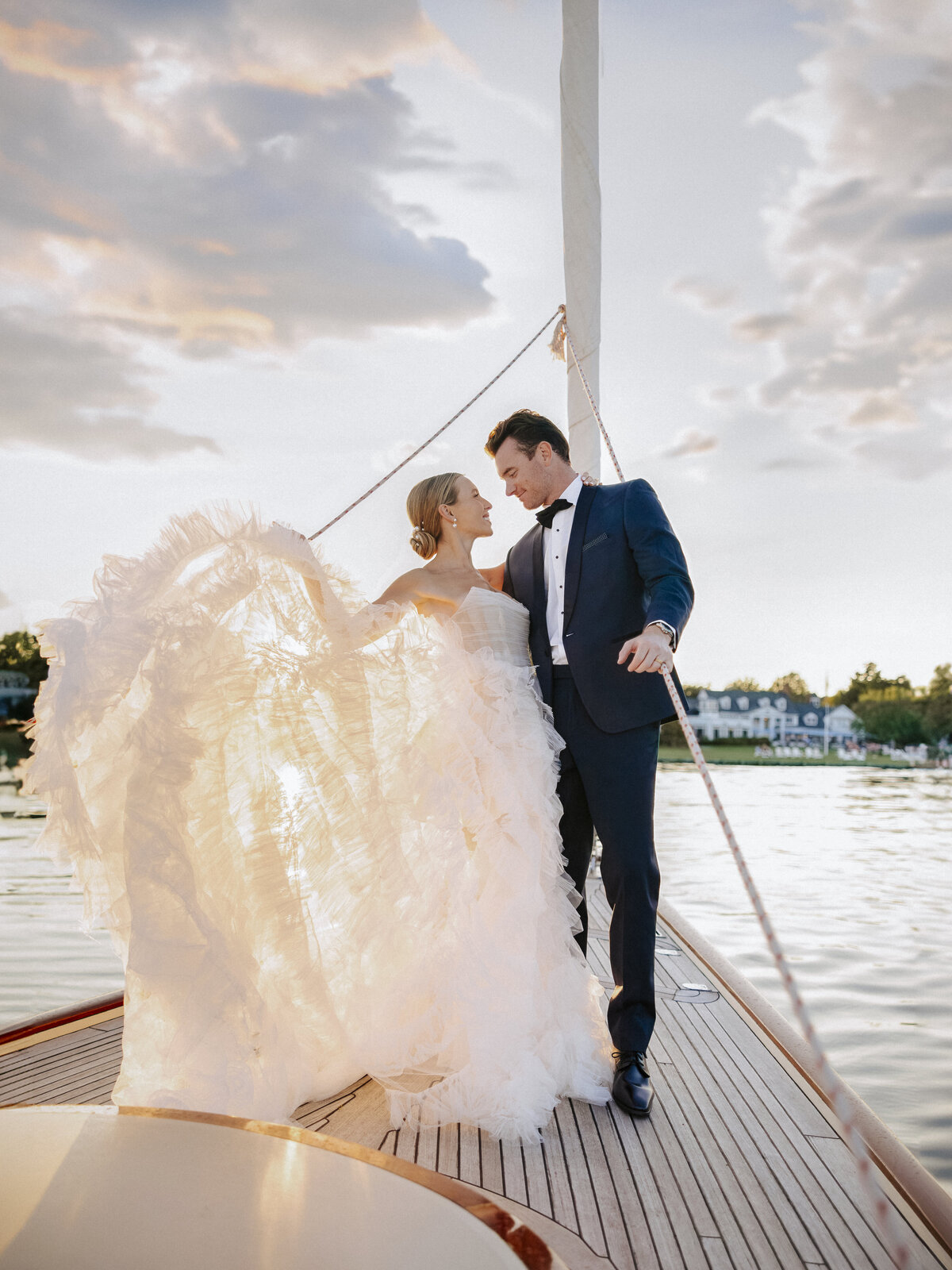 glamorous-wedding-dress-windy-sailboat-joyous-couple