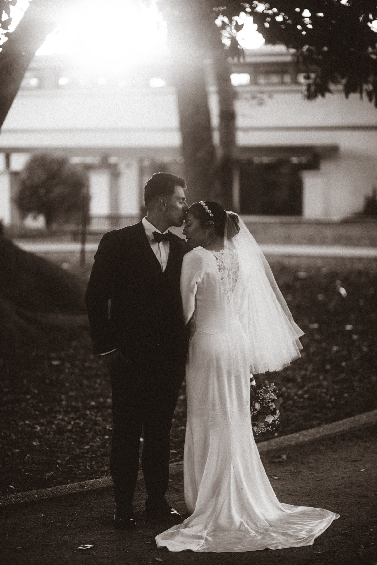 Wedding Photograph Of Groom Kissing Bride's Forehead Black and White Los Angeles