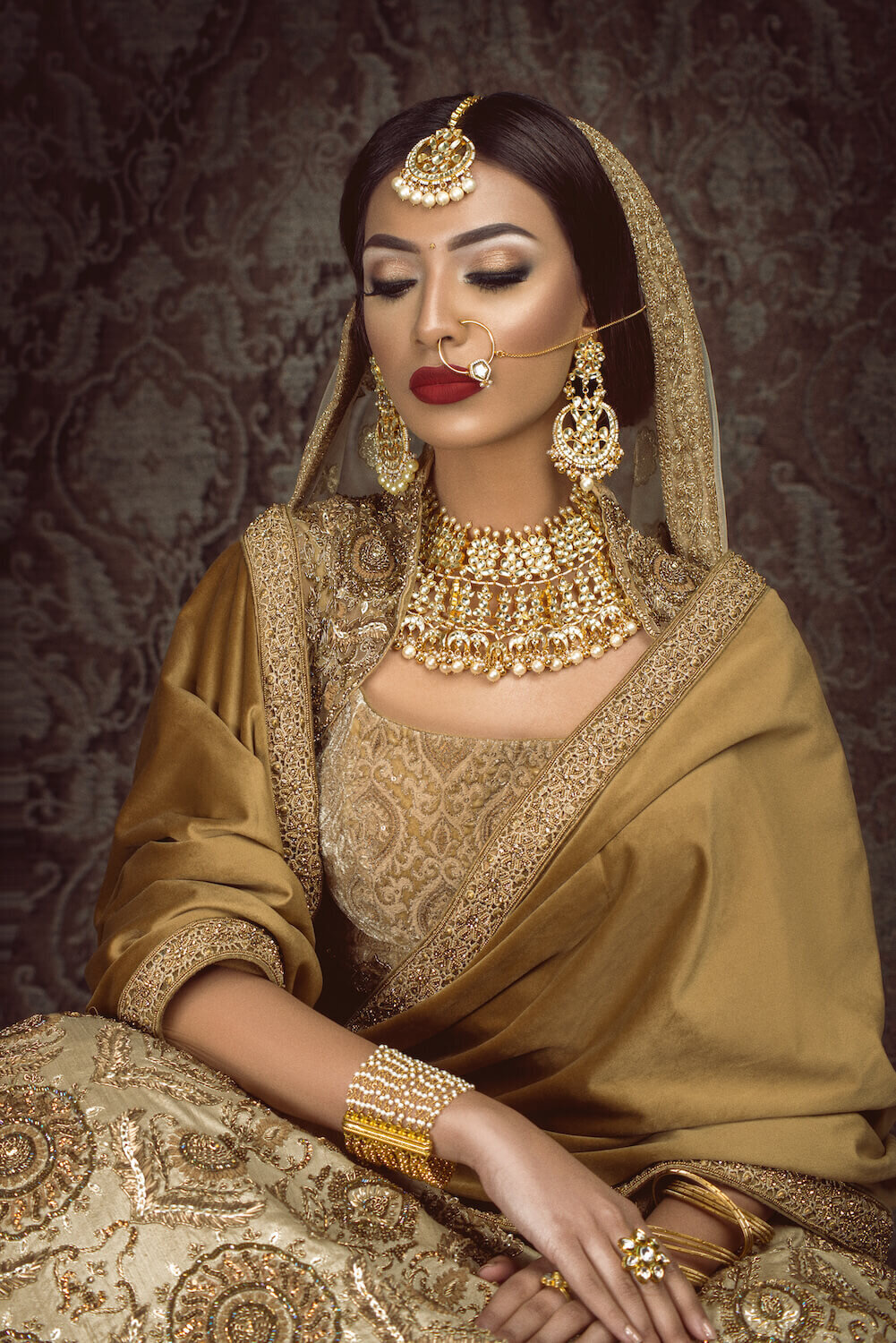 Stunning bride wearing a beautiful outfit and jewellery