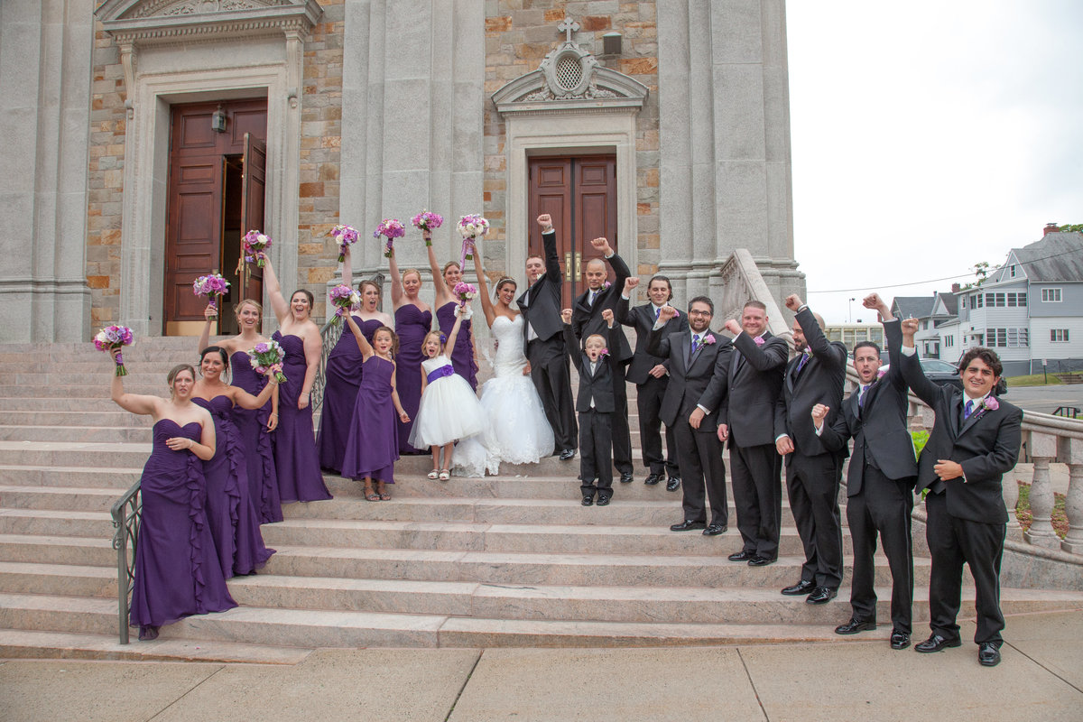 wedding party on front steps of church