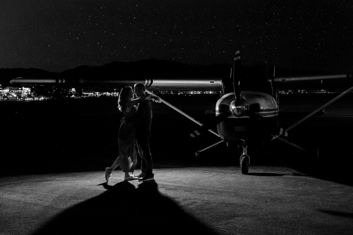 nighttime-airport-engagement-photo-couple-silhouette-airplane-san-diego-photographer