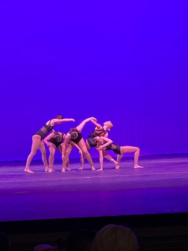 High school velocity team on stage at dress rehearsal 