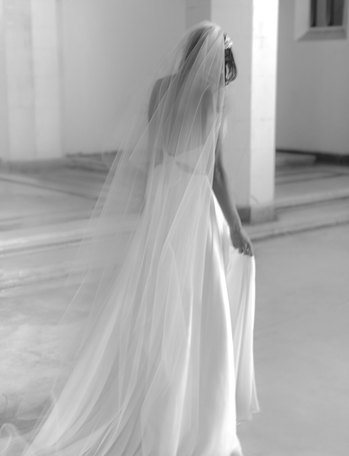 soft film Italy wedding photographer Christina Harrison captures bride, long ethereal veil