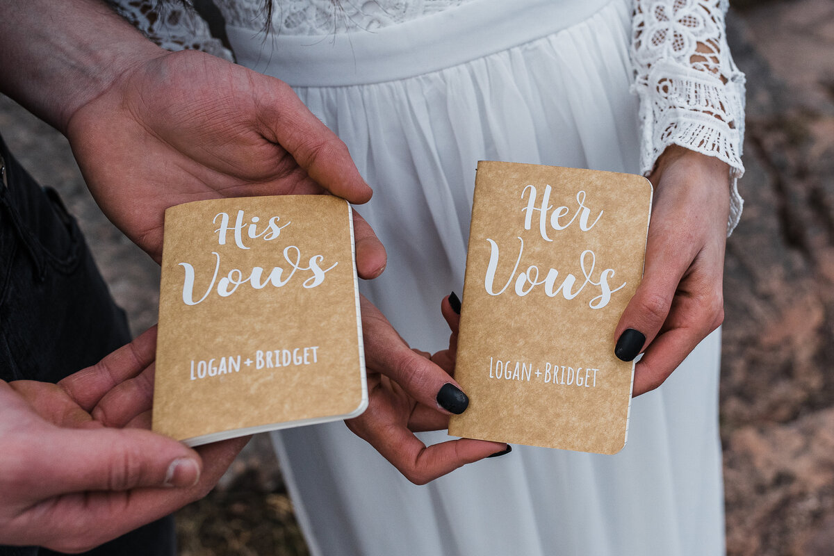 Closeup of vow books for elopement