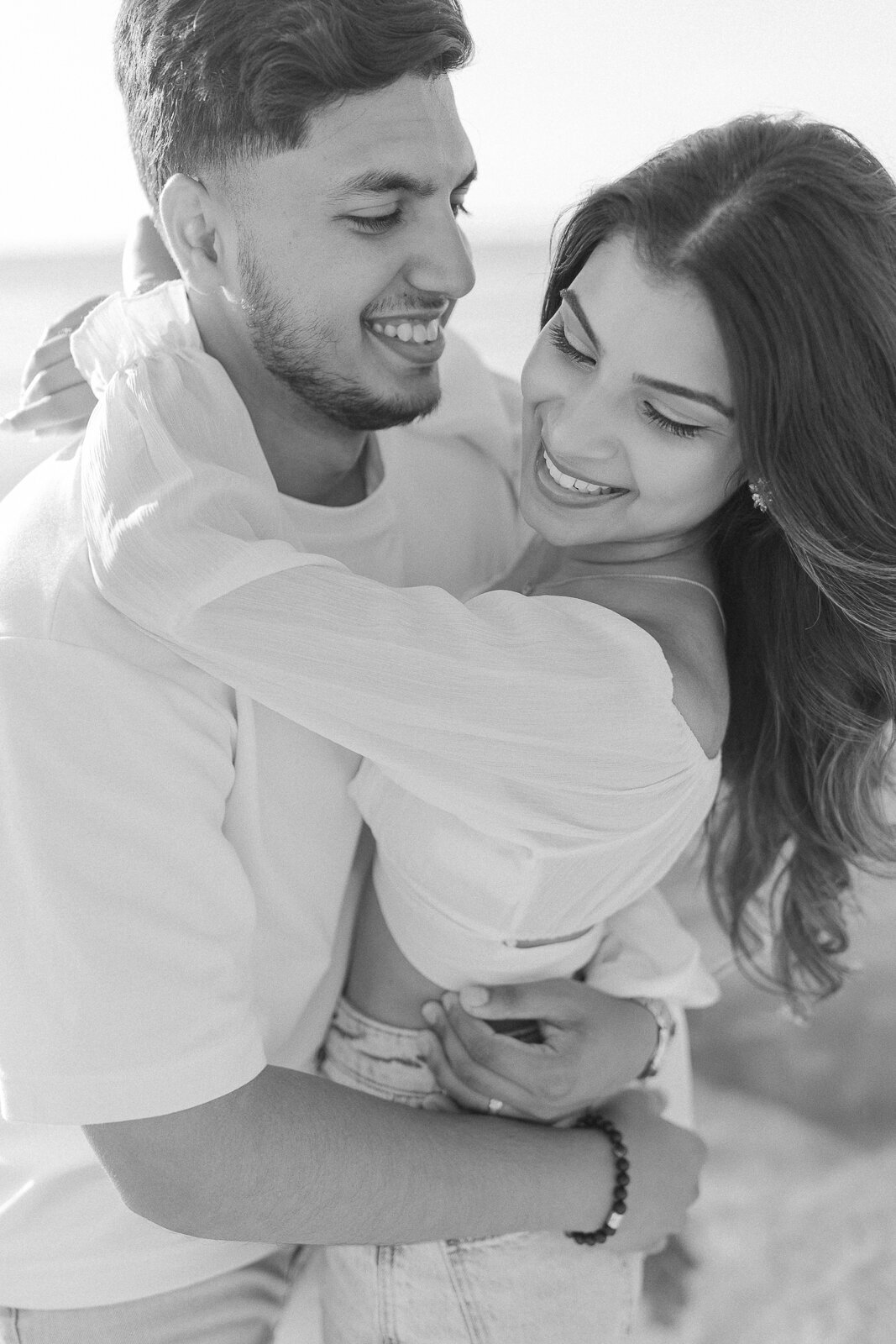 Couple poses together for engagement shoot outside Lancaster PA