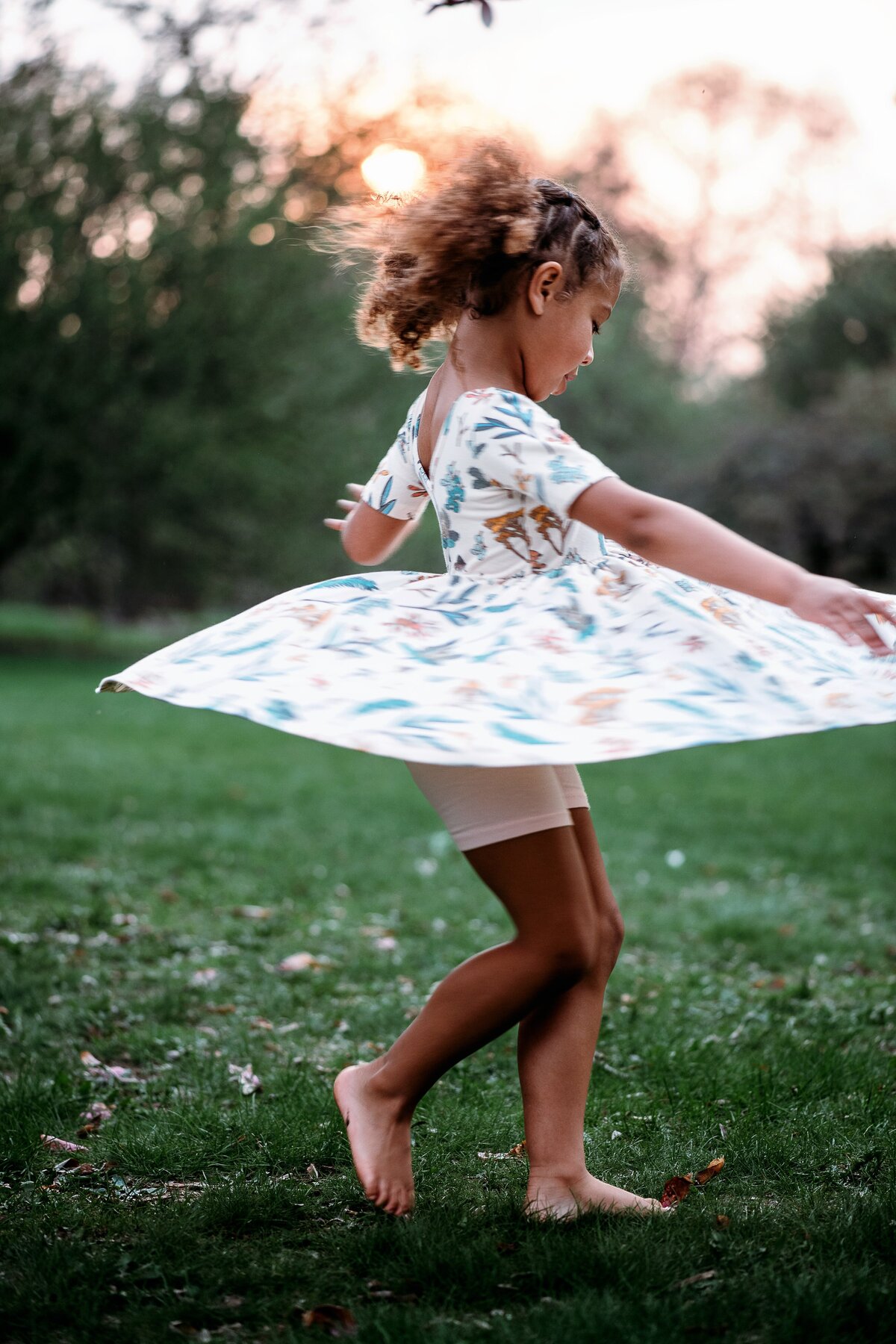 Child twirling sunset McKennaPattersonPhotography