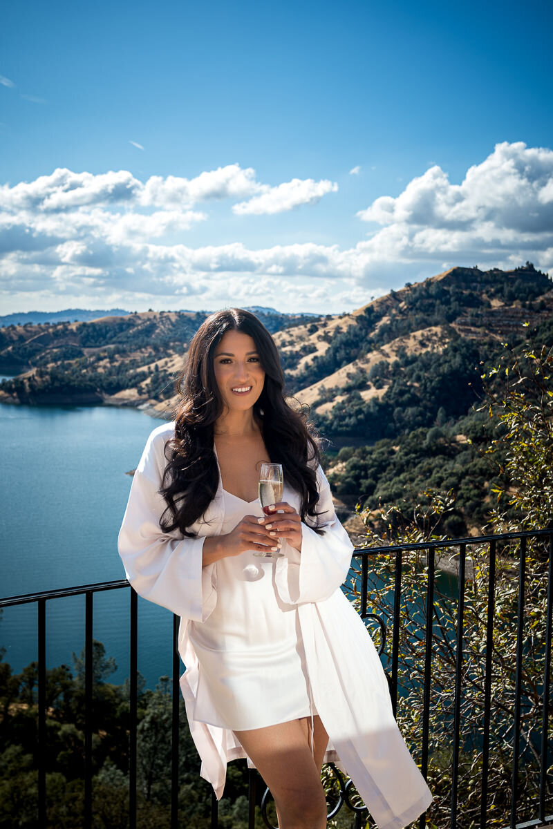 The bride prepares for her big day in the cozy bridal suite, surrounded by the serene beauty of Airola Road Vineyards.