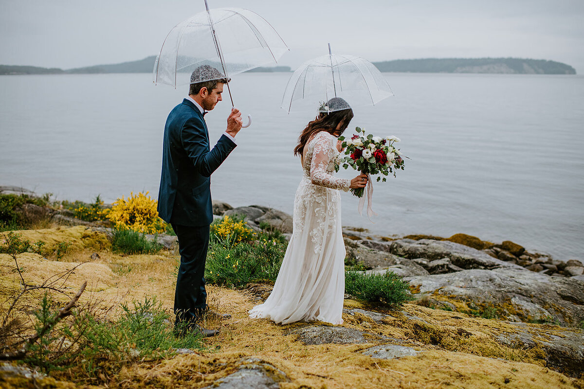 Couple during their ceremony during their elopement at the West Coast Wilderness Lodge on the Sunshine Coast B.C