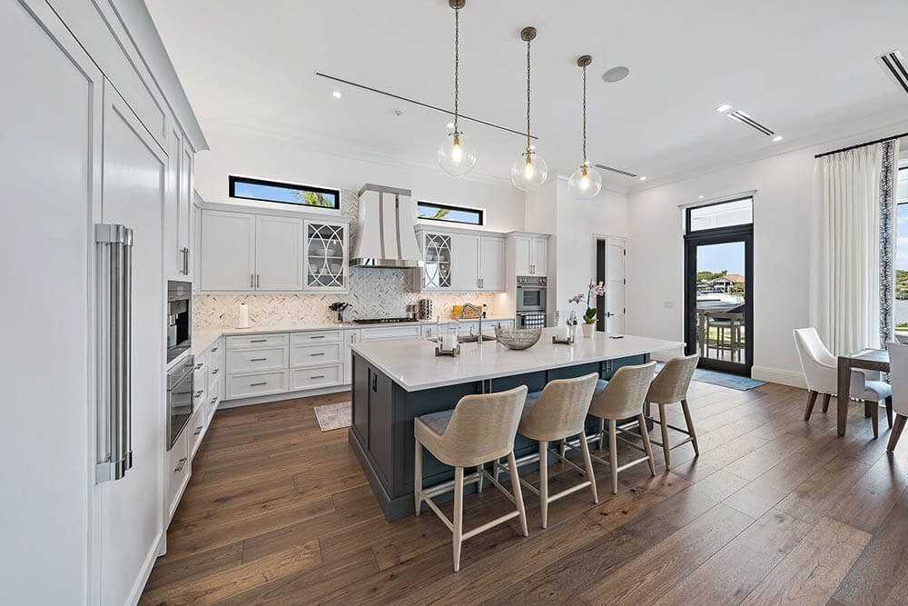 Stunning Coastal Kitchen Remodel with Bright White Cabinets and Island