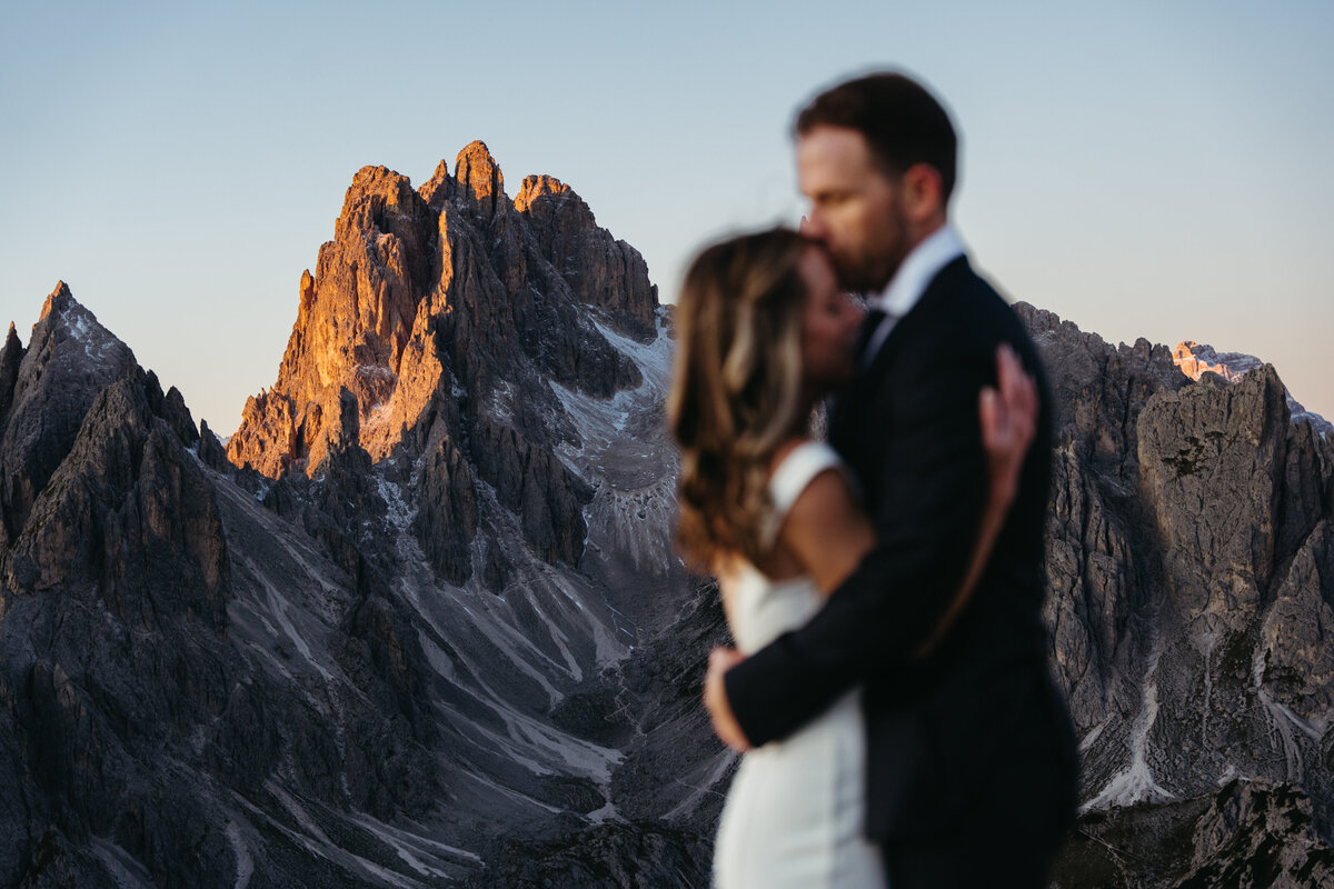 Couple eloping at Lago di Braies in Italy
