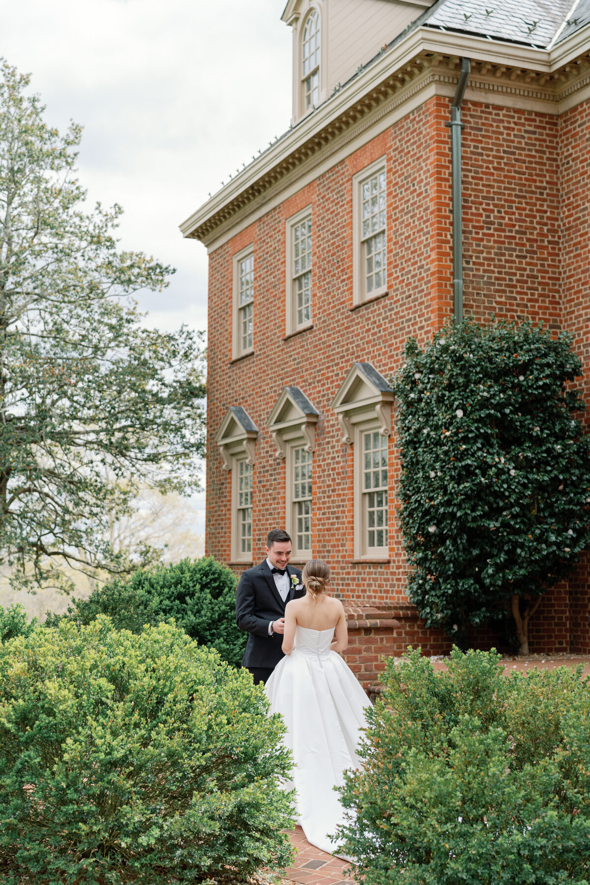 Wedding at the Estate at River Run in Maidens, VA | Wedding Photographer in Richmond | bride and groom share private vows in front of the Estate at River Run