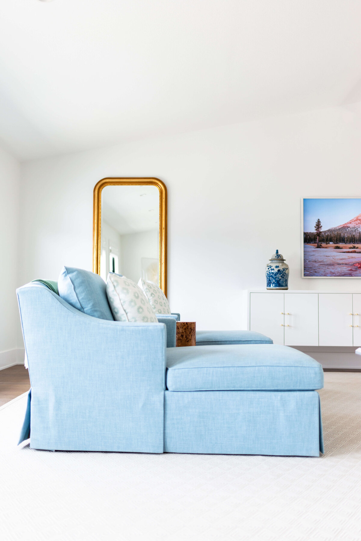 oyster creek studios building belt new build blue chair with gold floor length mirror and oriental vase with white cabinet