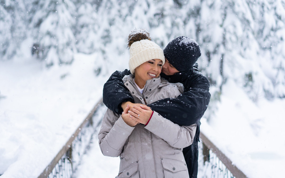 Snowy engagement session at Grouse Mountain after their proposal
