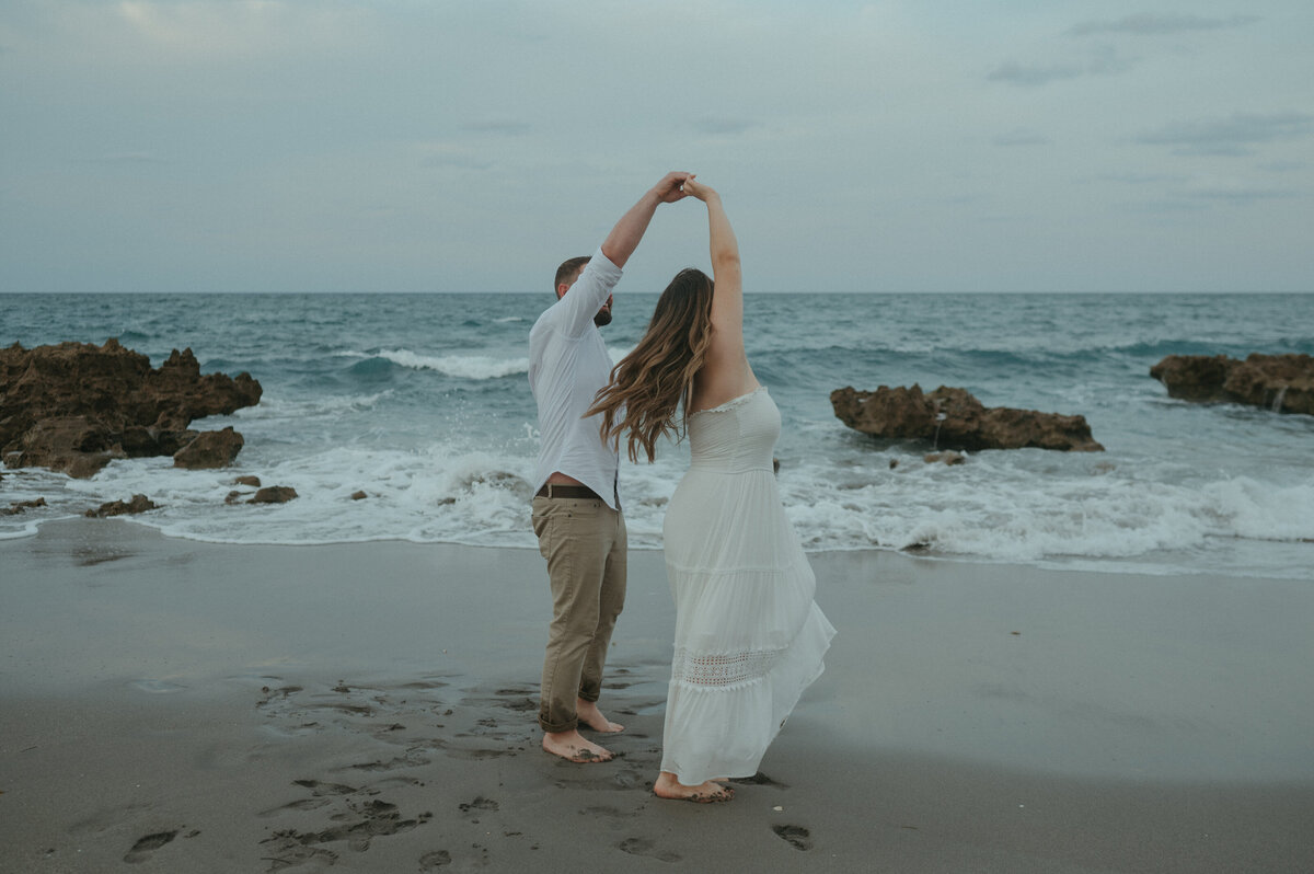 couple dancing on beach
