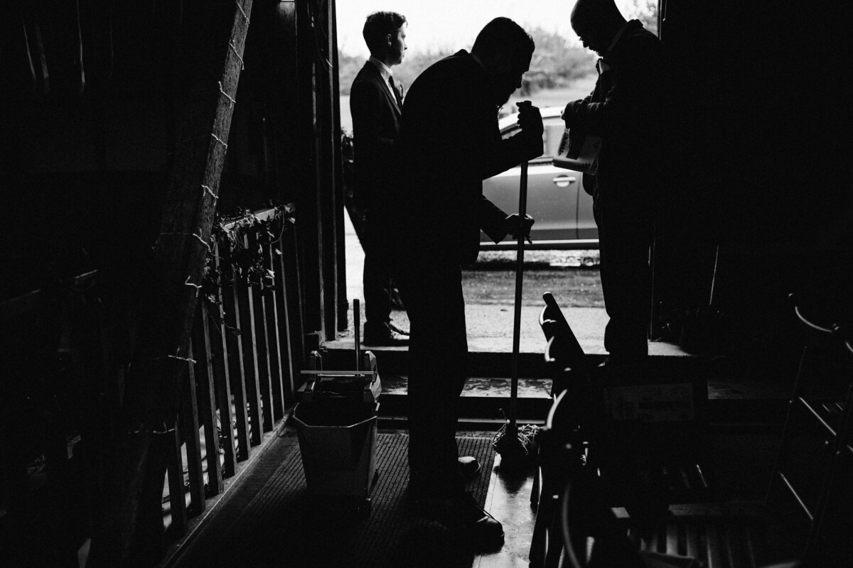 Black and white detailed photography of backstage musicians